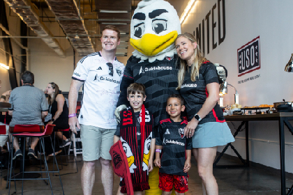 Family with DCU Mascot