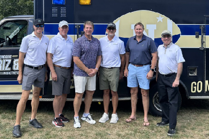 Group of men standing around