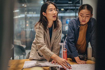 Women at table designing