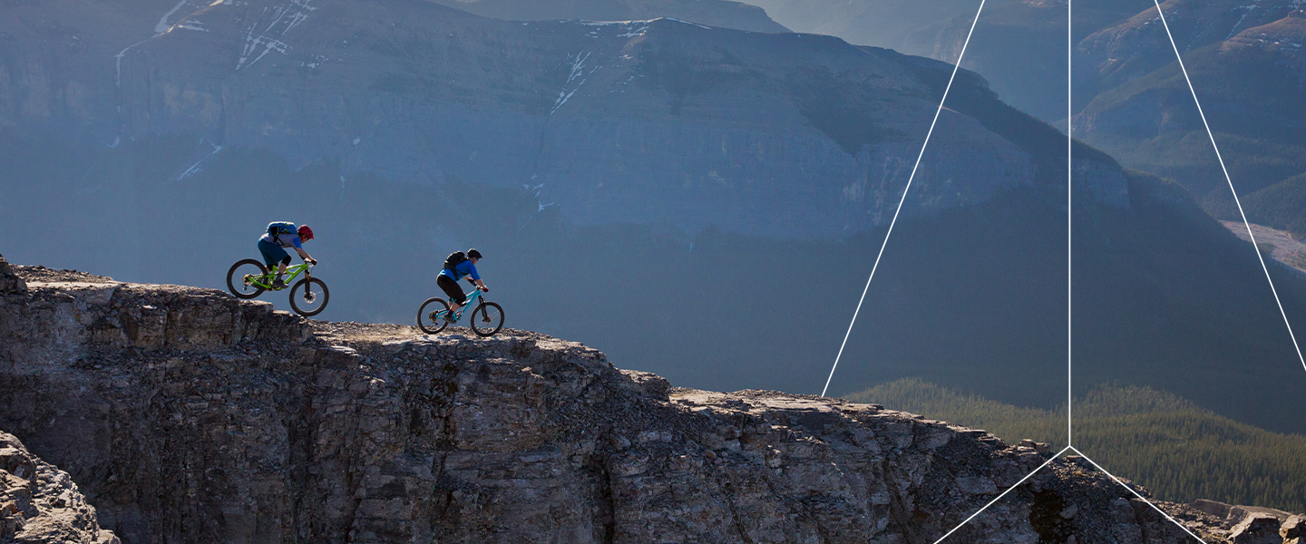 Two mountain bikers on cliff