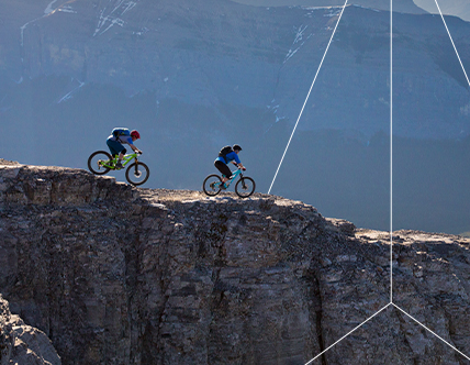 Two mountain bikers on cliff