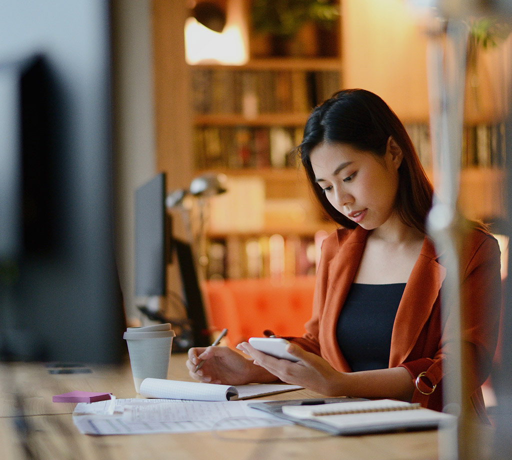 Contractor-woman-at-desk-1024x920