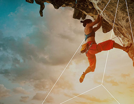 Guidehouse rock climbing at sunrise 