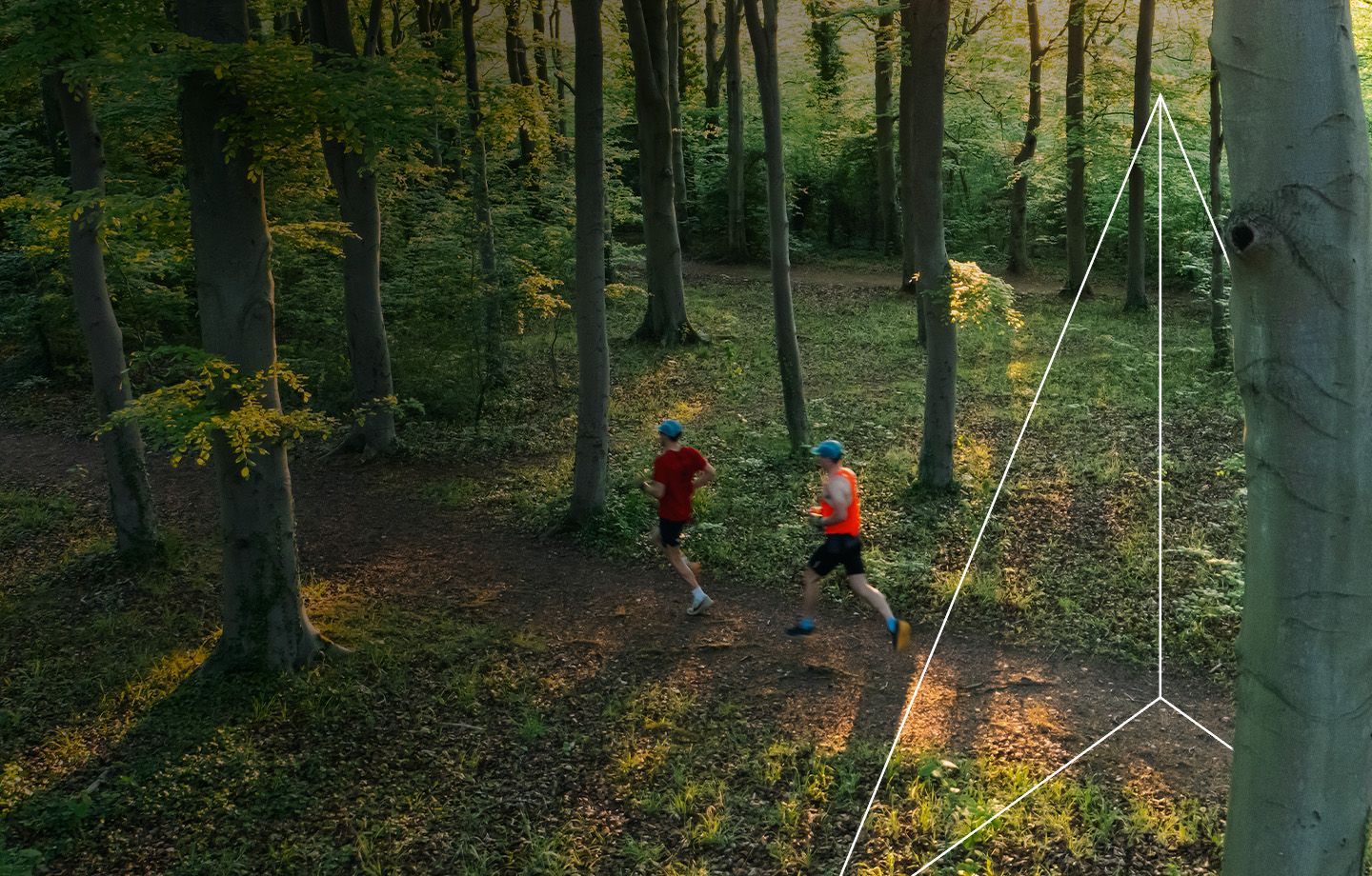 Two runners in the woods