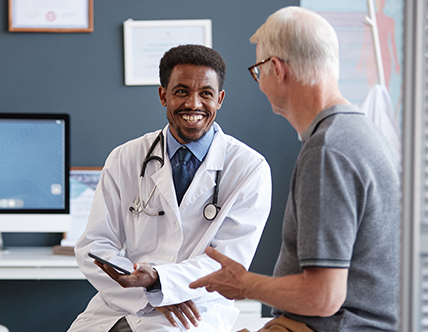 male doctor and male patient having conversation