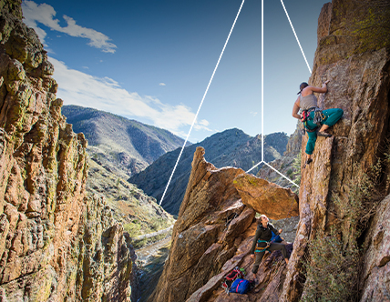 two cliff climbers