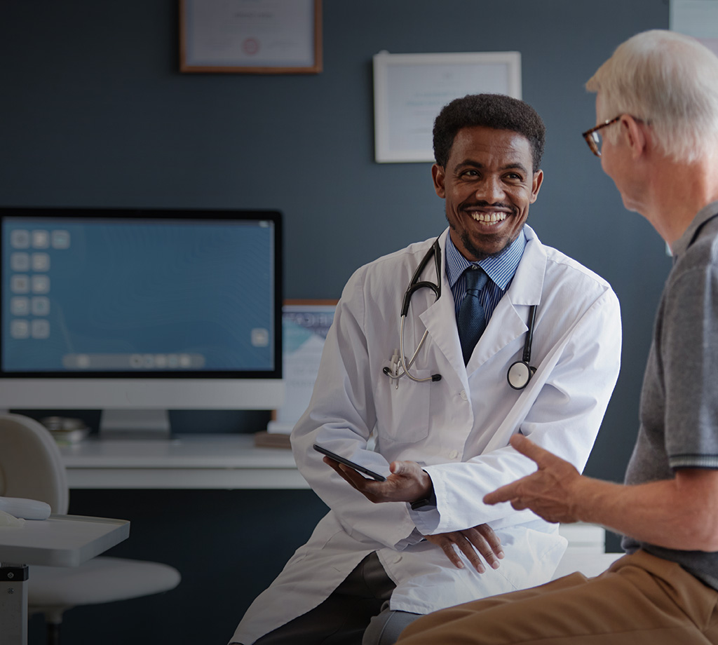 male doctor and male patient having conversation