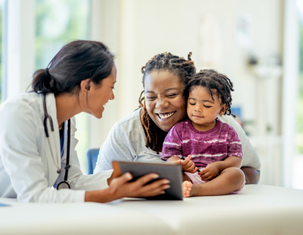 A_young_Mother_and_her_son_visit_the_doctor-428x332