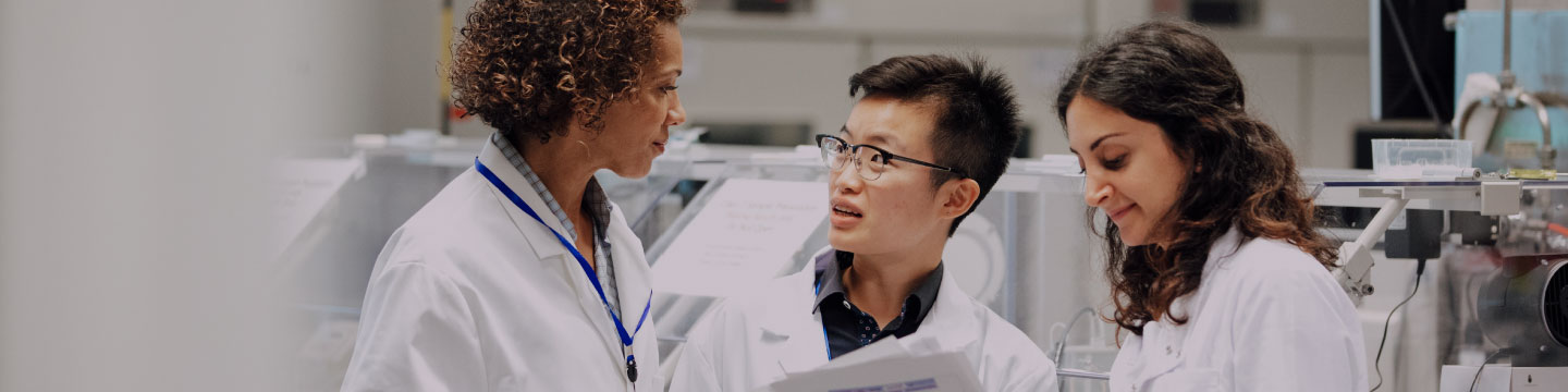 Three doctors talking