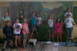 Girl Scounts with mural